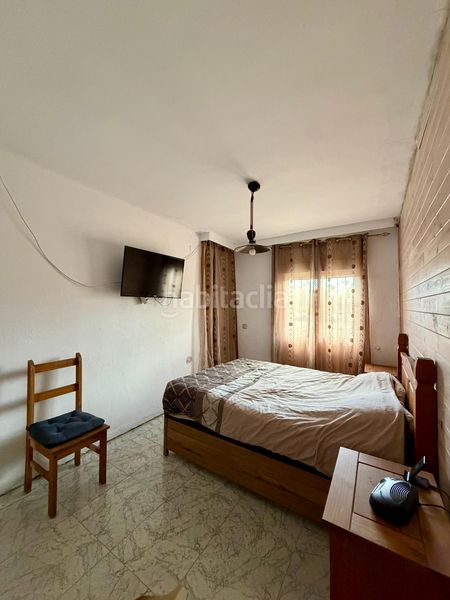 Foto e1401cd2-35f4-4747-b7a2-0a6b59991e31. Maison jumelée avec parking dans Villanueva del Ariscal