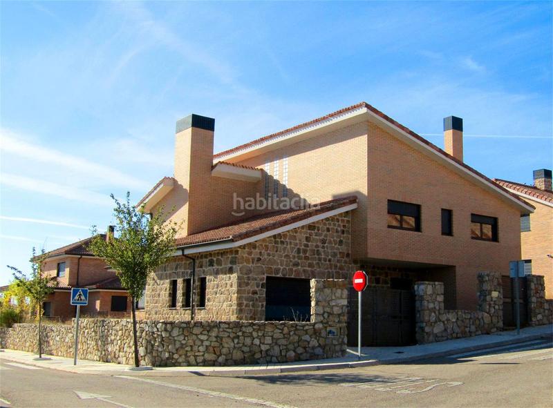 Foto f0dc665c-4ec3-4350-8b86-eb9e8e6f7a7c. Promotion Urbanización Los Pinarejos dans Miraflores de la Sierra. Logements de biens neufs