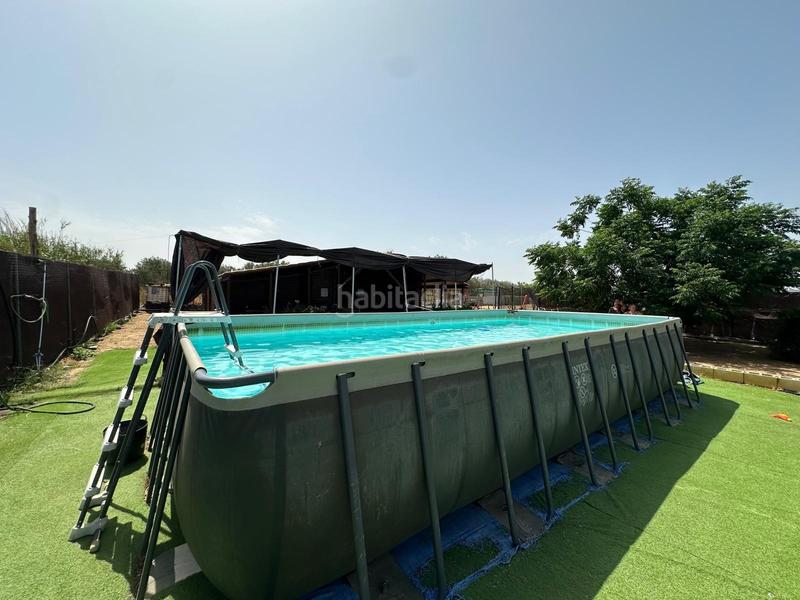 Foto b9c65437-f4b8-4a47-83c1-aa7531558de0. Casa parcela camino molares en Centro Utrera