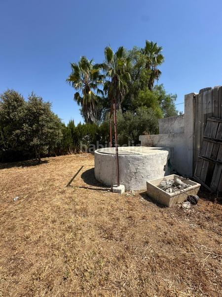 Foto f27ba9fb-b320-447b-a230-af6c7dcde697. Casa con parcheggio in Pedanías Sur Utrera