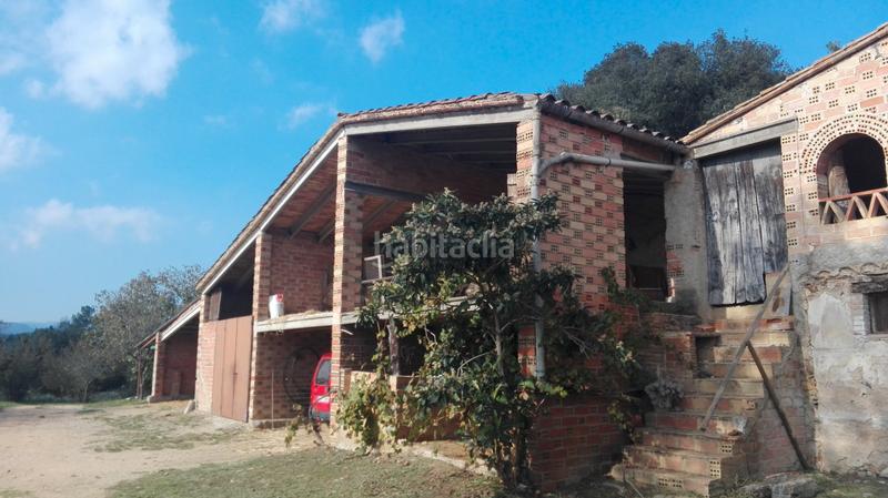 Foto cc700b06-83bc-4cb9-b3f5-f87b625d72d4. Country house with fireplace in Brunyola i Sant Martí Sapresa