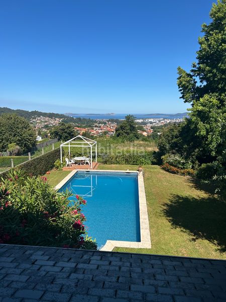 Foto ebbaa7d5-7ae3-4028-86e5-dab178d21bb4. Xalet amb xemeneia calefacció aparcament piscina a Vigo
