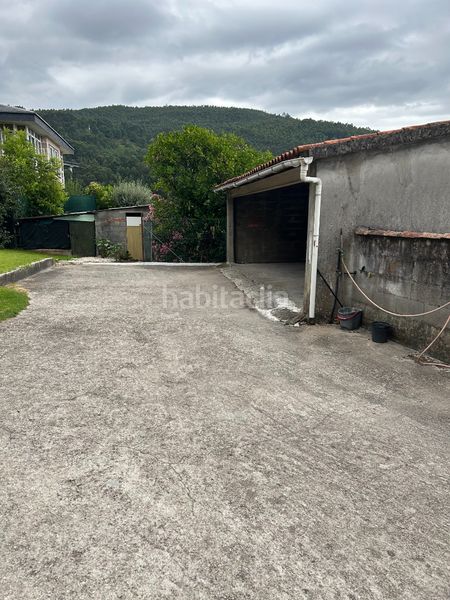 Foto 3f9d3a67-b9c1-4b12-8020-de280715c448. Casa amb xemeneia aparcament a Moaña