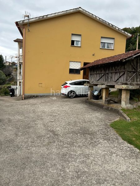 Foto 8e06cb3f-ec3e-4843-9d60-9d54f5248532. Casa amb xemeneia aparcament a Moaña