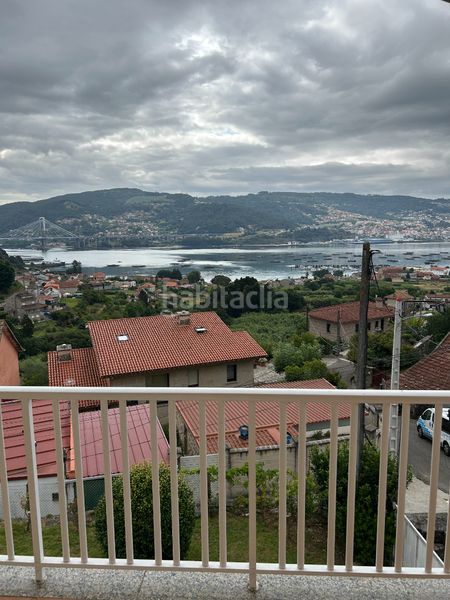 Foto 97522e3d-472d-46e5-af0f-0254d8df50e9. Casa amb xemeneia aparcament a Moaña