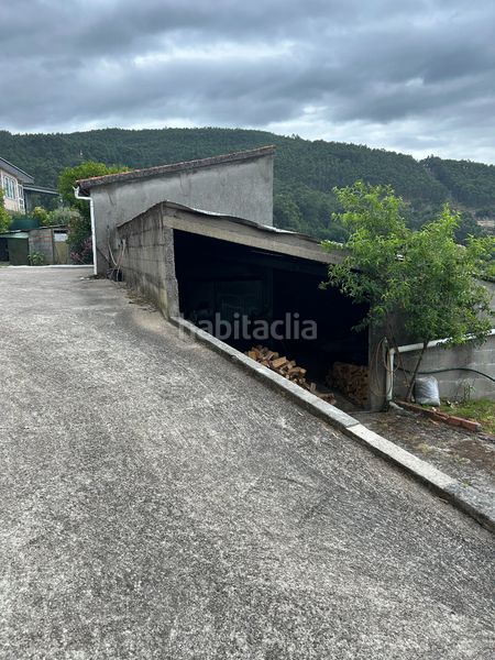 Foto 9bd2e4ee-e2b5-4fe0-b9ce-a48d5b300838. Casa amb xemeneia aparcament a Moaña