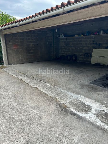 Foto a5871c1d-5446-4567-a485-383e74a38964. Casa amb xemeneia aparcament a Moaña