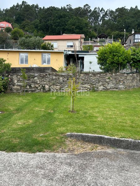 Foto aa81fd94-3183-445e-b963-fec1a0418e02. Casa amb xemeneia aparcament a Moaña