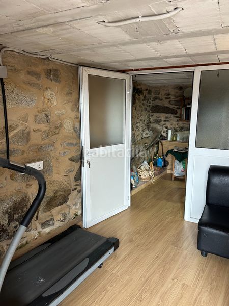 Foto f0bc83b5-d83b-42b5-a992-ba5ab91ab0a9. Casa amb xemeneia aparcament a Moaña