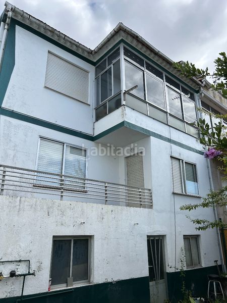 Foto 11d05f08-afc8-4d2c-bdfb-3537a4a0eb72. Casa aparellada amb calefacció a Redondela