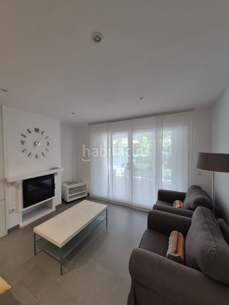 Foto 15927ee9-061f-46ac-9892-25937fe6353a. Apartament amb xemeneia piscina a Centre-Platja Platja d´Aro