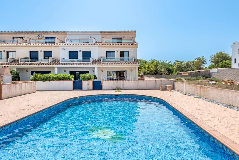 Foto 467dba0b-b5c7-42a3-93f6-87b5ada34132. Casa pareada chalet esquinero con vistas al mar en la preciosa urbanización de riumar en Deltebre