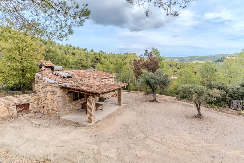 Foto fcc8d574-6856-4225-9056-b273fa7ceec1. Bauernhof mit kamin heizung parking in Falset