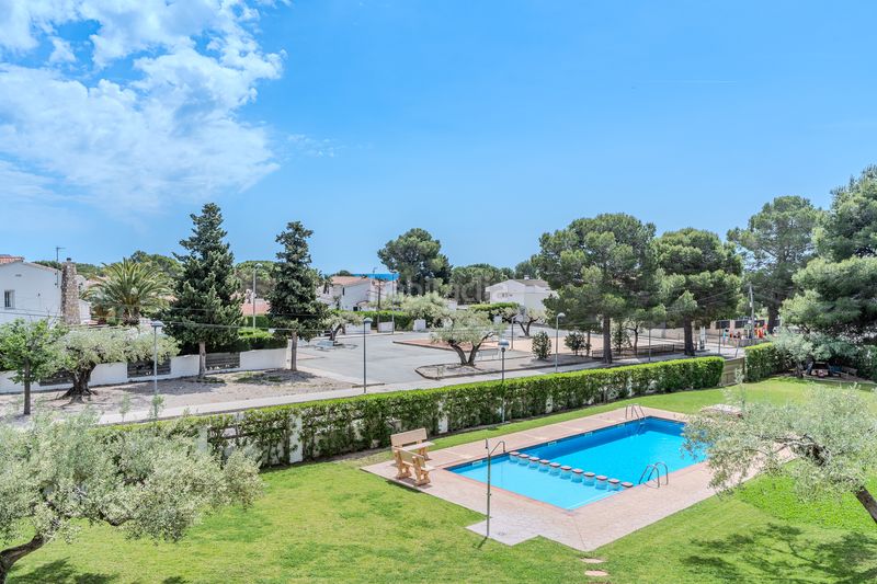 Foto 046320c0-52ef-4238-871a-e708d1935766. Duplex con riscaldamento parcheggio piscina in Ampolla (L´)