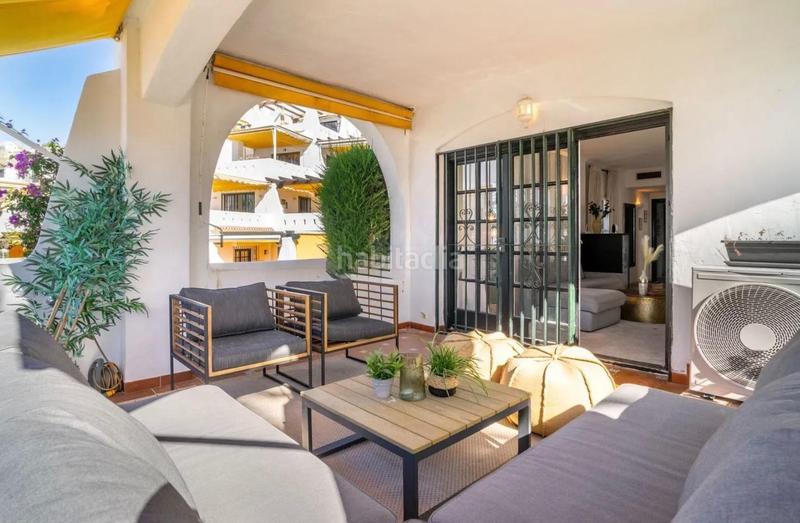 Foto e1217543-a0bf-44b8-b261-82b8218b955a. Apartamento atractivo apartamento en planta baja con dos amplias terrazas en aldea blanca en Marbella