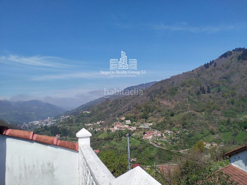 Foto 04ac0996-4442-490d-a511-8c5ff6ca280d. Casa adossada a Aller
