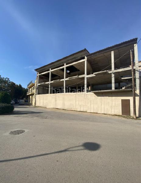 Foto b7b199b1-fc39-46dd-b23c-108c122a8051. Edifici a creu 21-23 a Bordils