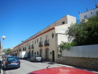 Local commercial à Sevilla 127-131. Local en venta