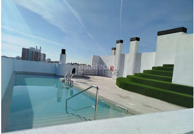 Foto 18260a4f-cd0b-46b5-8b02-66bb960e1918. Pis amb aparcament piscina a Bellavista Sevilla