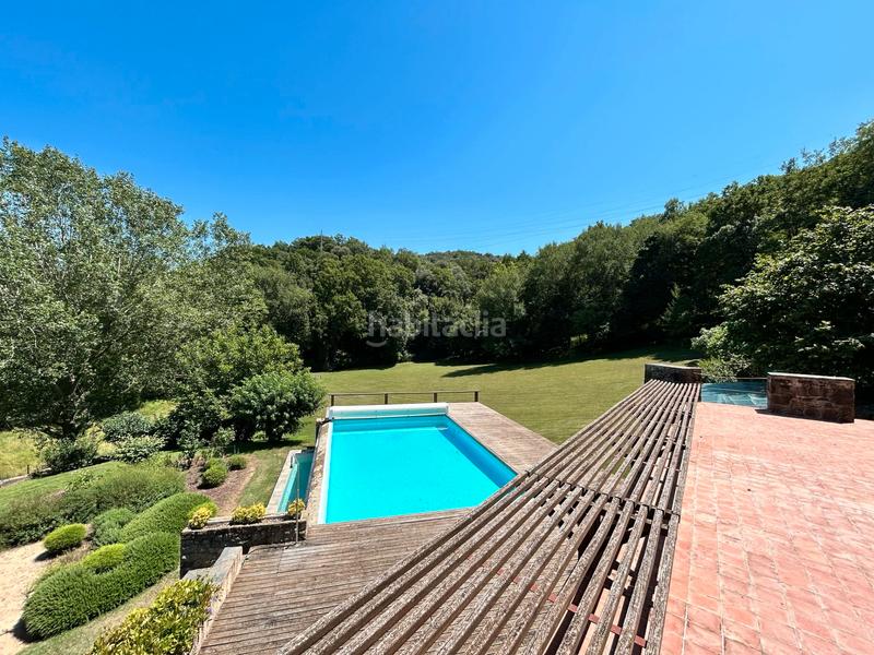 Foto 6239e7f3-4d39-451a-b167-fb55c8d9e95a. Casa con camino riscaldamento parcheggio piscina in Sant Joan les Fonts