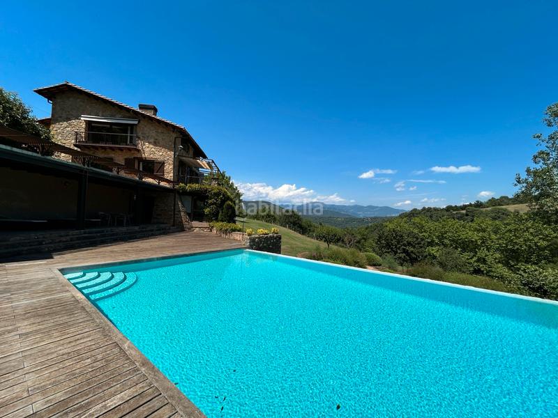 Foto ee7a1a8e-70af-475c-8afa-65e7a3807cd8. Casa con camino riscaldamento parcheggio piscina in Sant Joan les Fonts