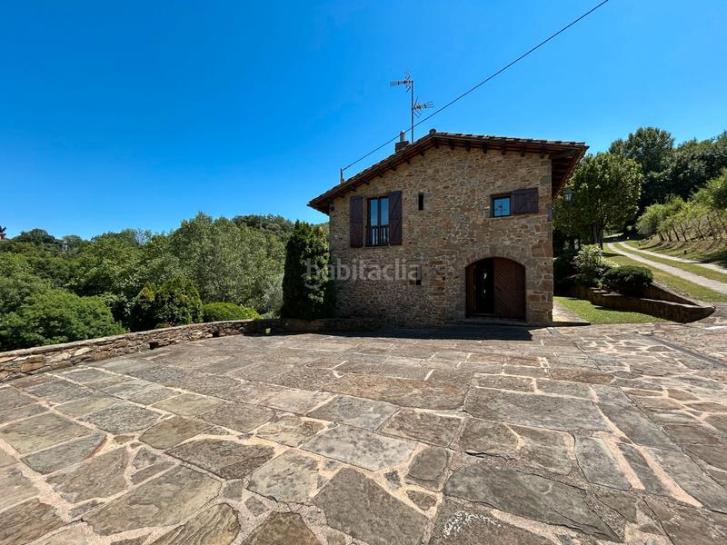 Foto f3d3d44c-1e87-4b45-b56c-9627ad76b9ce. Casa con camino riscaldamento parcheggio piscina in Sant Joan les Fonts