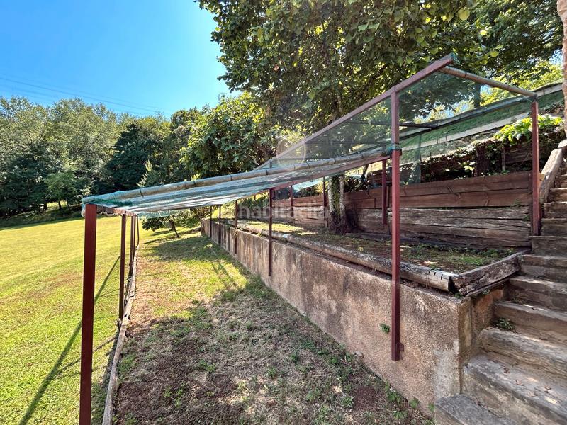 Foto fd2811e5-799e-48fc-ac24-a9024e85a2fc. Casa con camino riscaldamento parcheggio piscina in Sant Joan les Fonts