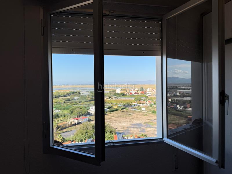 Foto ab5fc670-cbb8-4fc4-b925-f33ad492a9fd. Etagenwohnung mit parking in Mareny de Barraquetes Sueca