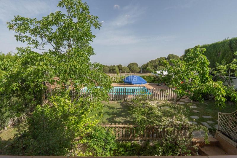 Foto 0f6f8d79-f90c-42cf-aca0-a92432b3cc84. Chalet avec chauffage parking piscine dans Cumbres Verdes Zubia (La)