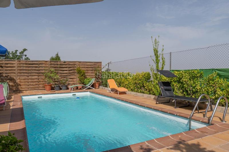 Foto ec6bbc07-278a-48d0-a5f0-919d333c5159. Chalet avec chauffage parking piscine dans Cumbres Verdes Zubia (La)