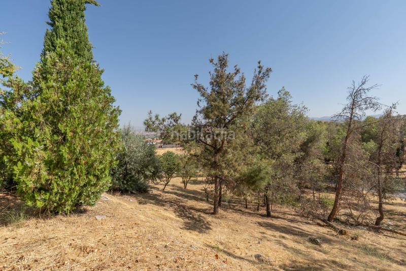 Foto b0183de6-c7d8-46a0-81d9-8b03abb5ad2e. Casa aparellada amb calefacció aparcament piscina a Zubia (La)