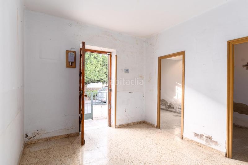Foto 1b9fd900-dbd1-4ce9-95c5-038811993c82. Casa adosada casa centrica para reformar en Albolote