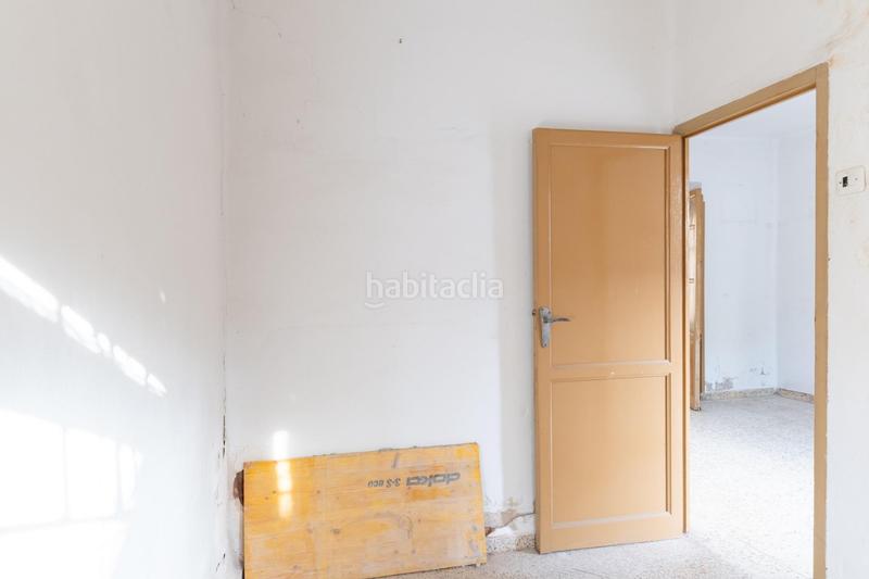 Foto ed399f51-76c1-4907-9aae-d12da1df9dd7. Casa adosada casa centrica para reformar en Albolote