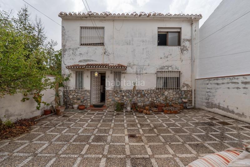 Foto 57663d8b-f1cc-4ac5-95da-e0268877fc9b. Chalet en camino de la barrera (far) 58 en el Fargue 2000 metros de parcela segregable con chalet de 178m en tres plantas mas nave de 90 metros!!! en Granada