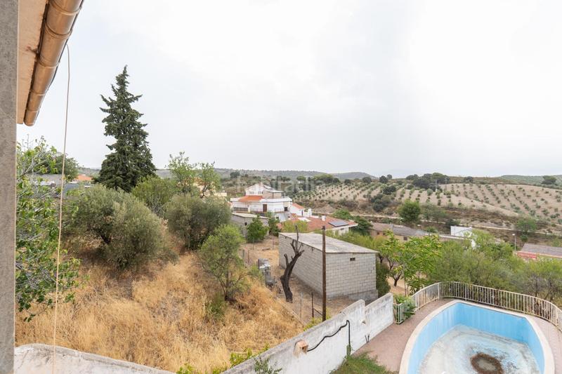 Foto d77c73d5-2046-4bbd-aa8a-1fbc0b764bb4. Chalet en camino de la barrera (far) 58 en el Fargue 2000 metros de parcela segregable con chalet de 178m en tres plantas mas nave de 90 metros!!! en Granada