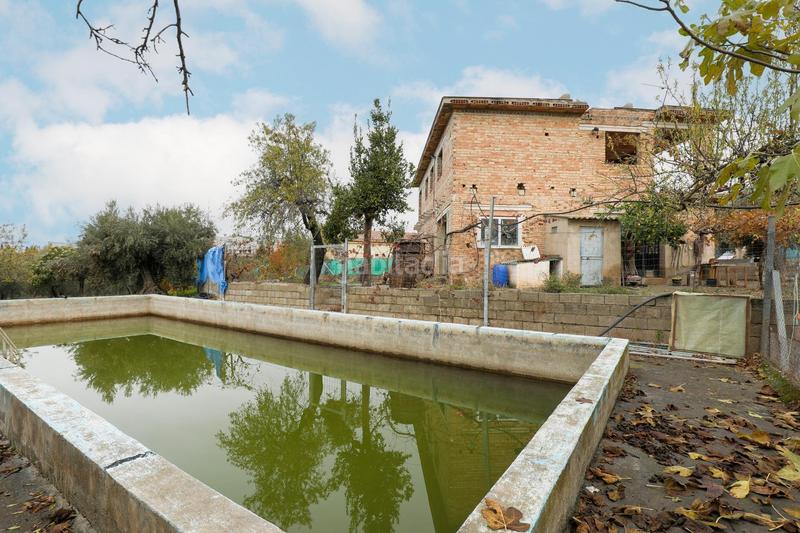 Foto 610976d8-cc1a-4330-a2b6-45dc67fdfe3a. Masia amb aparcament a Gójar