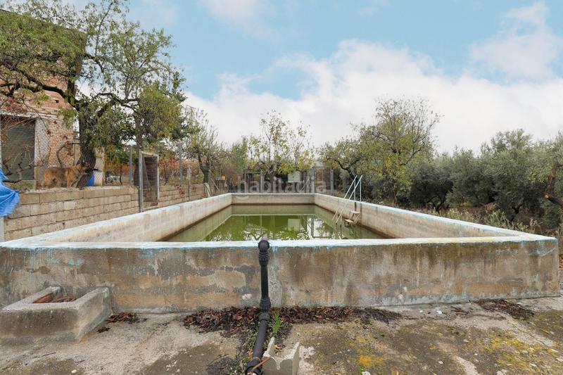 Foto cd02e1c0-144f-4263-8eb5-9a838ccc8e83. Masia amb aparcament a Gójar