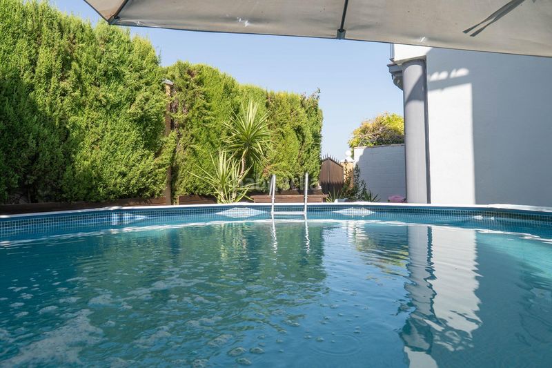 Foto b72c3de5-d3c3-40fe-a0de-26c89f35d598. Casa aparellada amb calefacció aparcament piscina a Zubia (La)