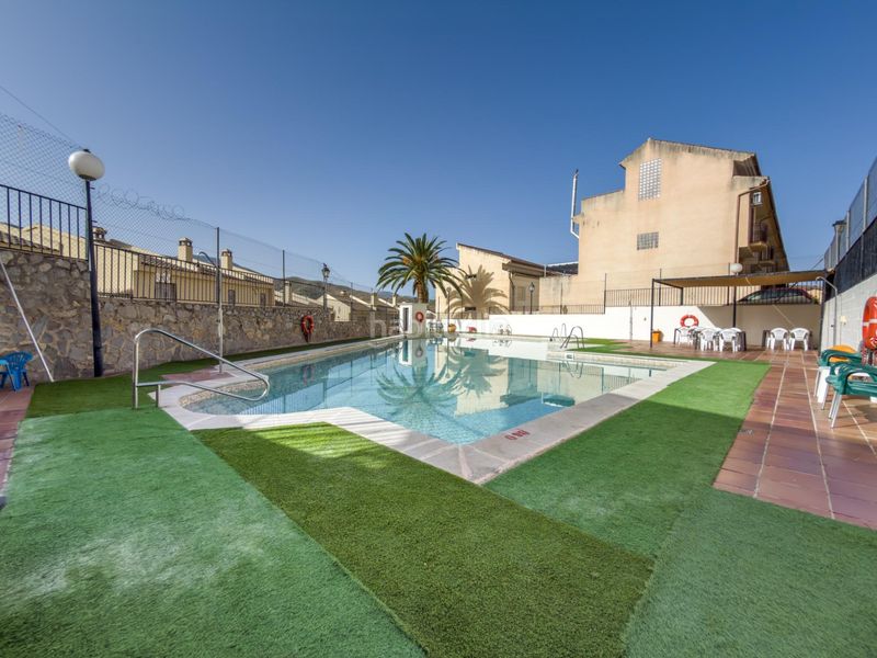 Foto fac7b63a-1471-4a2e-8efa-2ee1346351ce. Casa adossada a calle tiberio 7 a Cenes de la Vega