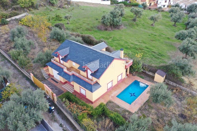 Foto ef1f477f-e1cc-4c91-97f9-cbcdac80a3f6. Xalet amb aparcament piscina a Güéjar Sierra