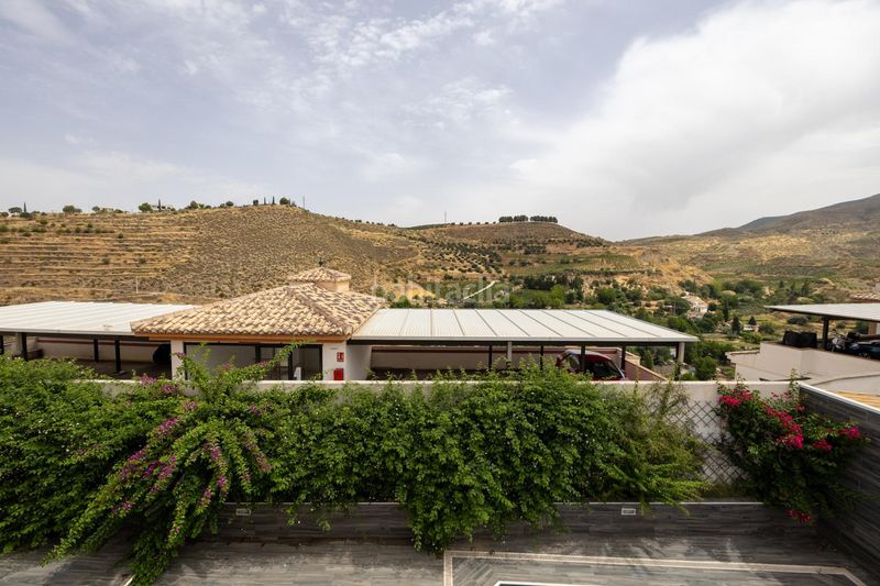 Foto 14f22c02-52fa-4153-9773-dd63929e246c. Xalet amb calefacció aparcament piscina a Barrio de la Vega Monachil