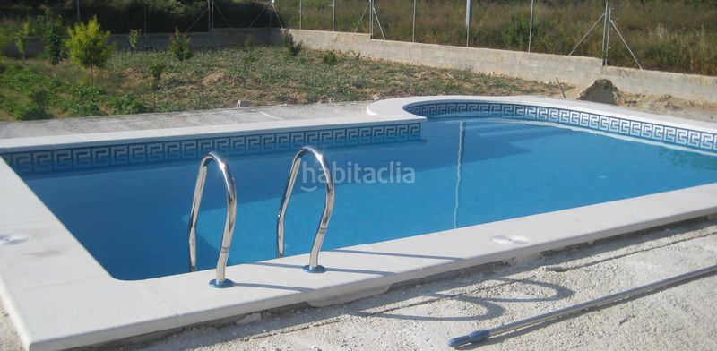Foto 3ce0d8ad-9fee-4627-ac98-a9ea49dde838. Masia amb xemeneia aparcament piscina a Pliego