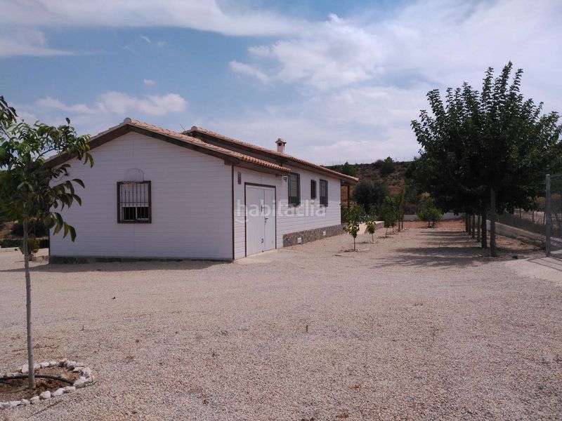 Foto f0115821-ea3e-4991-af21-6f288f94d6b6. Masia amb xemeneia aparcament piscina a Pliego