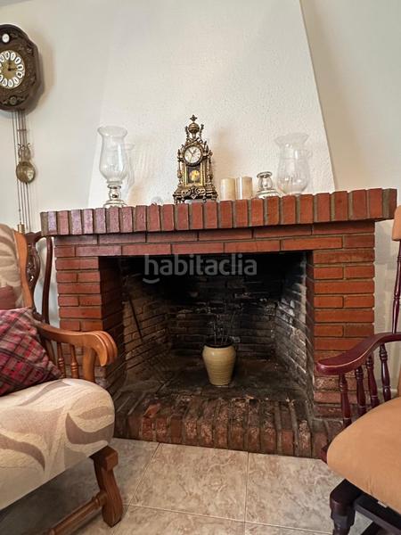 Foto bc1e95e2-7be4-424d-9bb2-5b94feef01a5. Casa adossada amb xemeneia aparcament a Golf Guadiana Badajoz