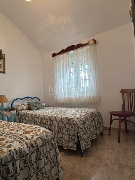 Foto fd4b0b09-f099-448f-9bd2-f94051c3a7ea. Casa adossada amb xemeneia aparcament a Golf Guadiana Badajoz