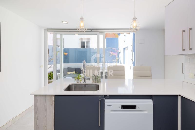 Foto ec336bd8-f8bc-4f05-bd32-f9832d9dd2e6. Casa adossada amb calefacció a Arroyo de la Miel Benalmádena