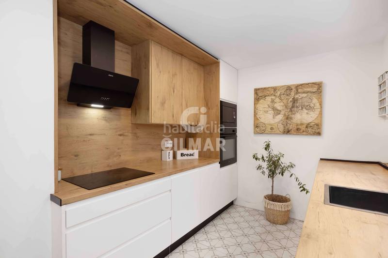 Foto ea2b782c-2efe-41c5-9863-1ca0bbb5f2cc. Casa adossada amb calefacció a Arroyo de la Miel Benalmádena