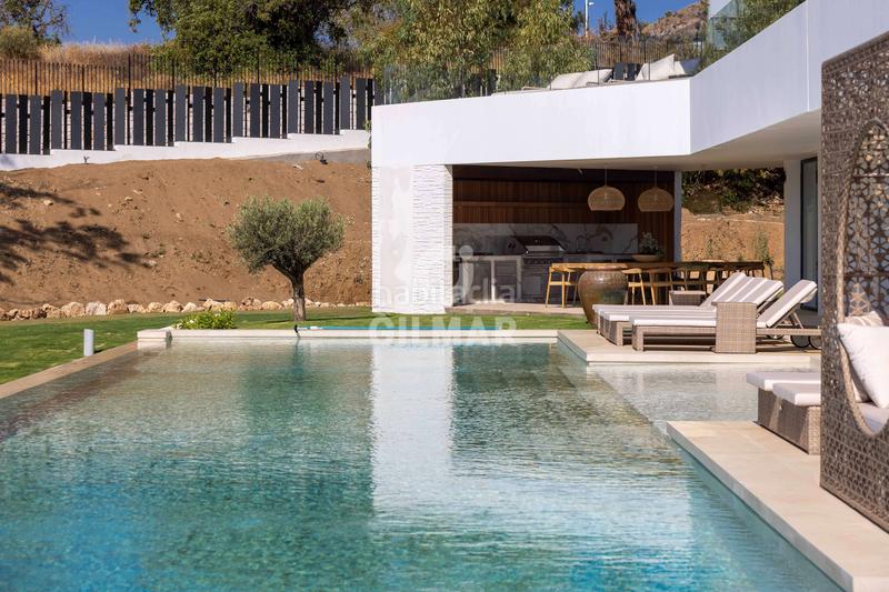 Foto 968028f7-f535-4fc6-9529-6fd70c2f383e. Chalet with heating parking pool in La Capellanía - El Higuerón Benalmádena