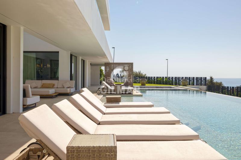 Foto cd9e2022-a77f-4bea-b899-8ebf55c60cb4. Chalet with heating parking pool in La Capellanía - El Higuerón Benalmádena