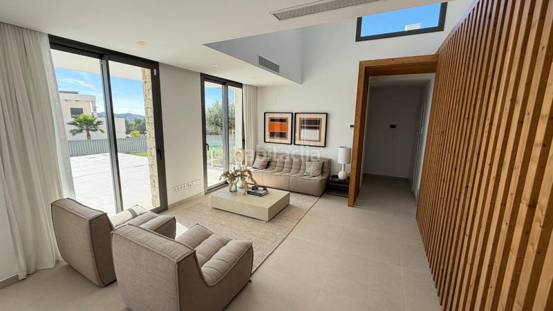 Foto 3db0a7a8-fd98-44bc-a997-b0d7c0a29e97. Casa aparellada amb piscina a Golf Bahía Finestrat